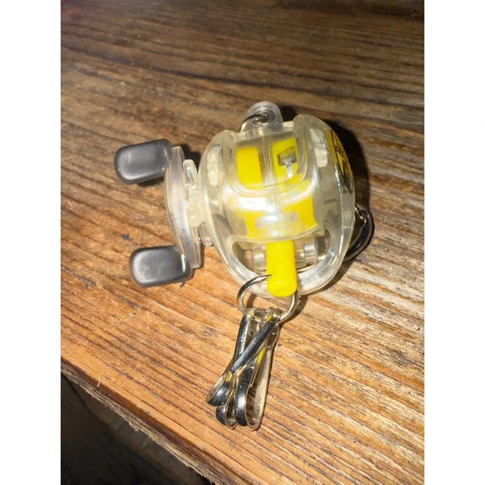 VTG Bass Pro Shops Fishing Reel Keychain Clear Yellow Novelty Mini Accessory